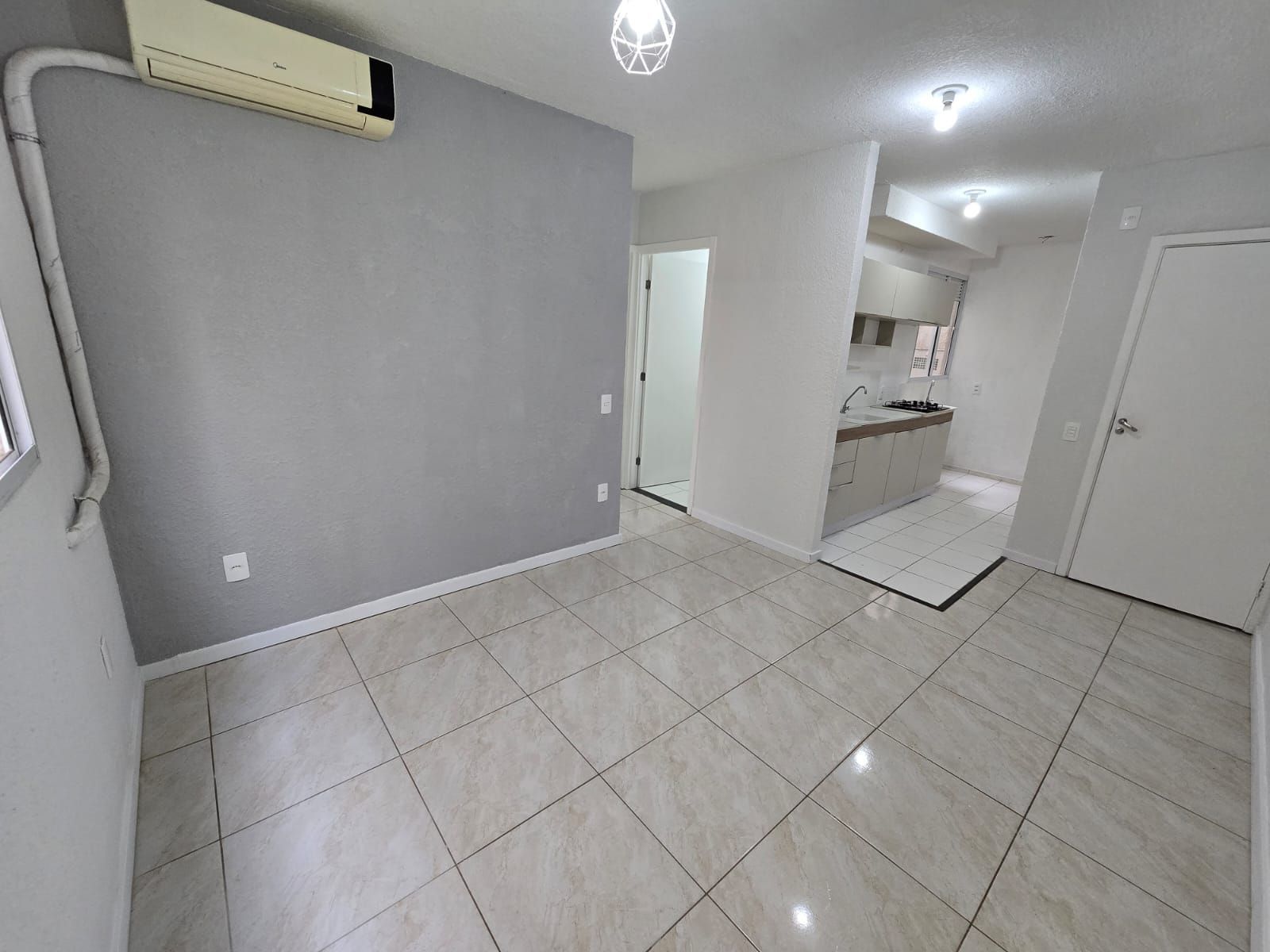 Apartamento à venda com 40m², 2 quartos, 1 vaga no bairro Restinga em Porto Alegre
