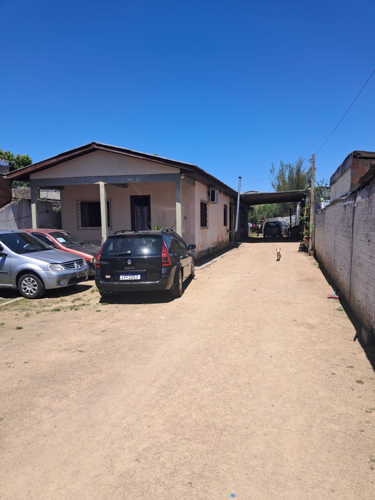 Terreno 11x160 com 2 casas