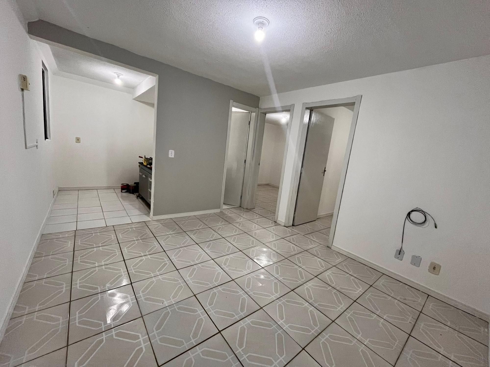 Apartamento à venda com 56m², 2 quartos, 1 vaga no bairro Restinga em Porto Alegre