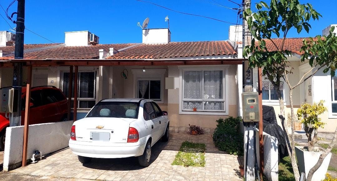 Casa em condomínio no bairro Hípica - 2 dormitórios - 1 Vaga