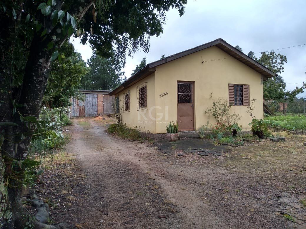 Casa à venda com 75m², 2 quartos, 4 vagas no bairro Hípica em Porto Alegre