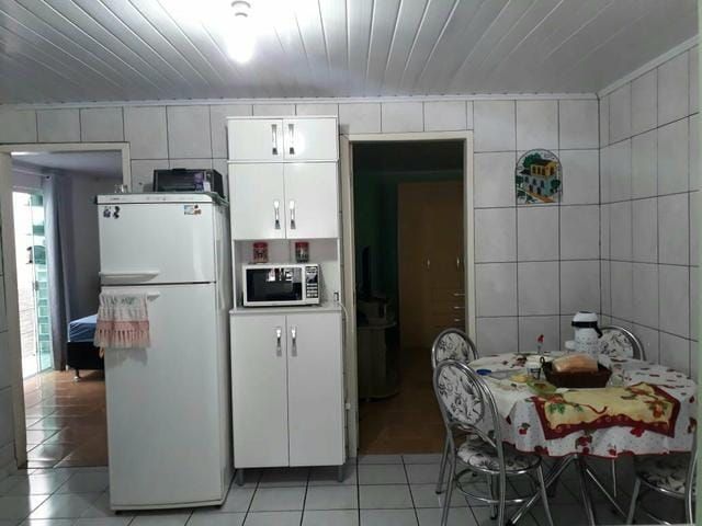 Casa à venda com 3 quartos, 100m² - Foto 4