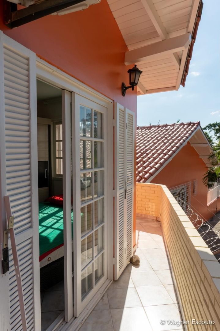 Casa à venda com 3 quartos, 197m² - Foto 7