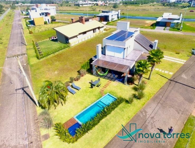 Casa com 4 dormitórios no condomínio Reserva das Águas em Torres-RS