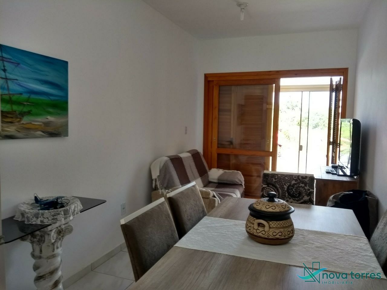 Casa com 2 dormitórios próxima ao Centro, em Passo de Torres - SC