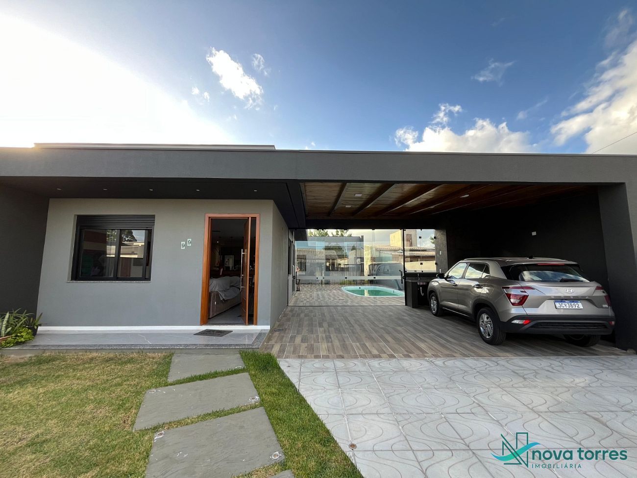 Casa com 4 dormitórios no bairro Novo Passo em Passo de Torres - SC