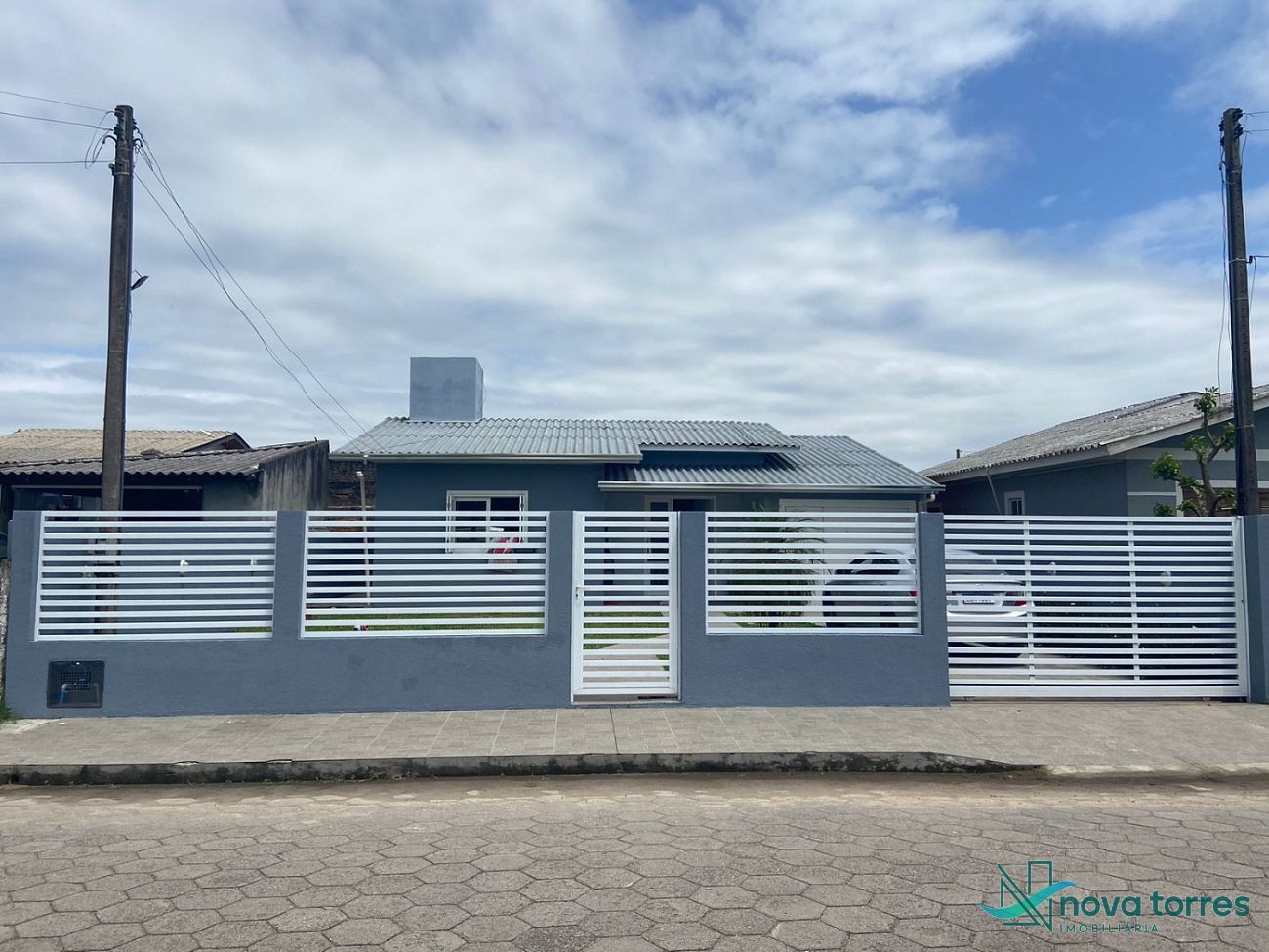 Casa com 2 dormitórios no Centro em Passo de Torres - SC