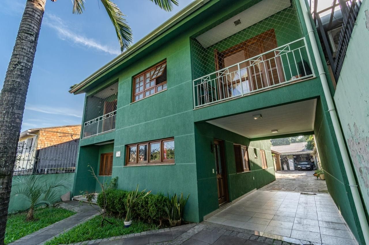 Casa 4 quartos à venda, 390m², Vila Jardim - Porto Alegre