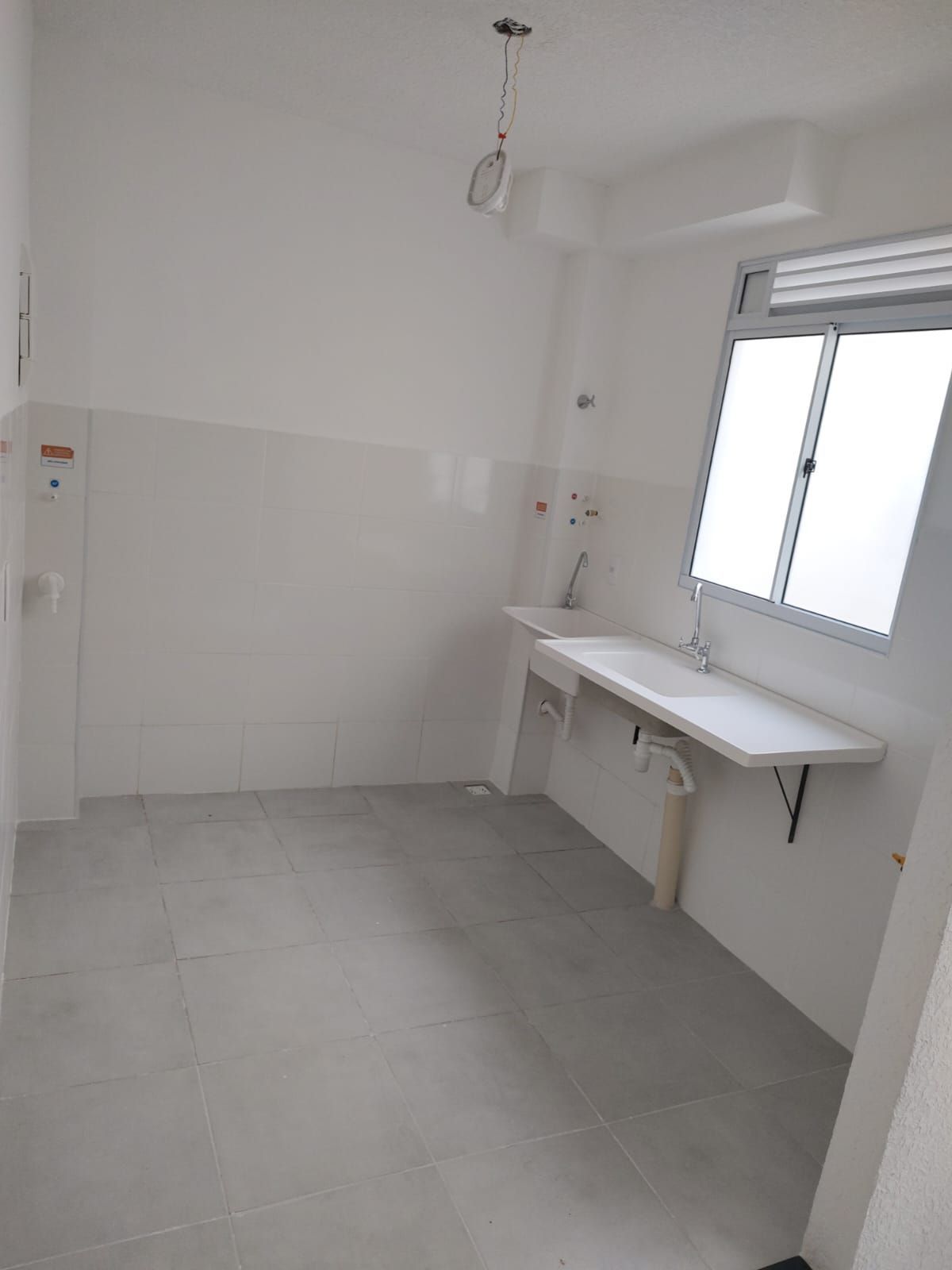 Apartamento à venda com 40m², 2 quartos, 1 vaga no bairro Restinga em Porto Alegre
