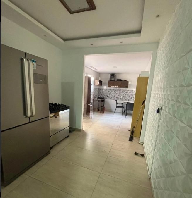 Casa de dois dormitórios com  02 suítes e 01 vaga de garagem