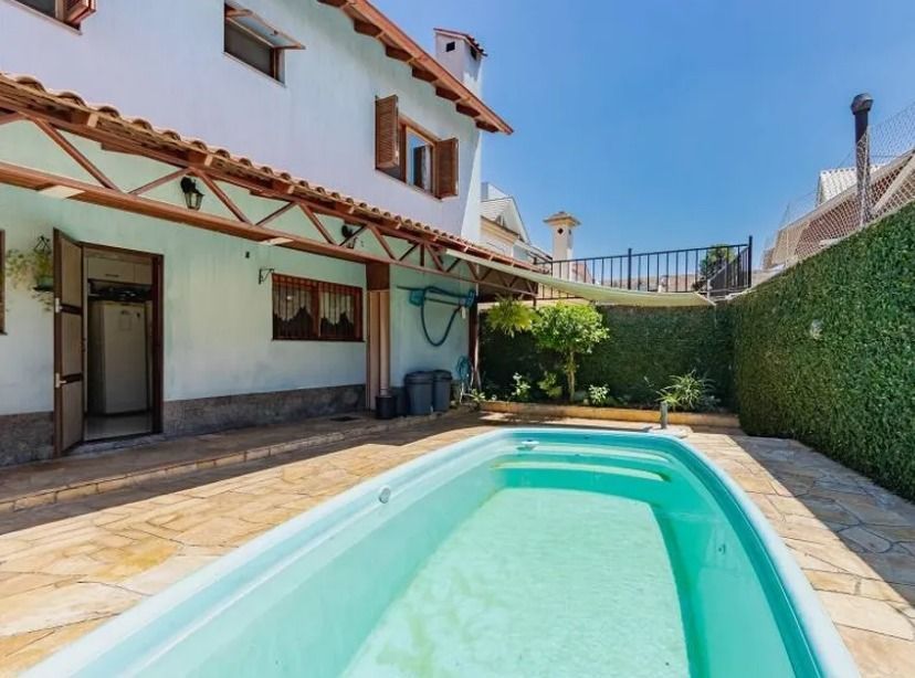 Casa com 4 dormitórios à venda, 245 m² por R$ 799.000,00 - Sarandi - Porto Alegre/RS