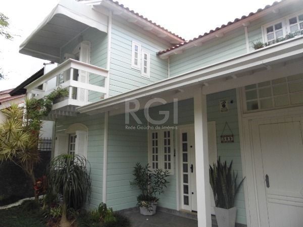 Sobrado para Venda - 208m², 3 dormitórios, sendo 1 suites, 4 vagas - Nonoai