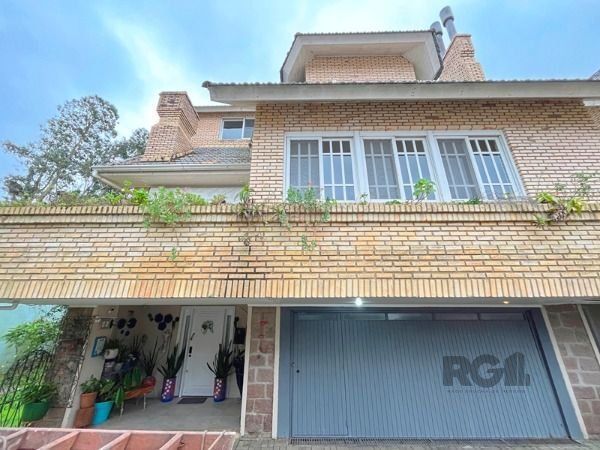 Casa Condominio em Porto Alegre, no bairro Jardim Isabel, com 3 dormitório(s), à