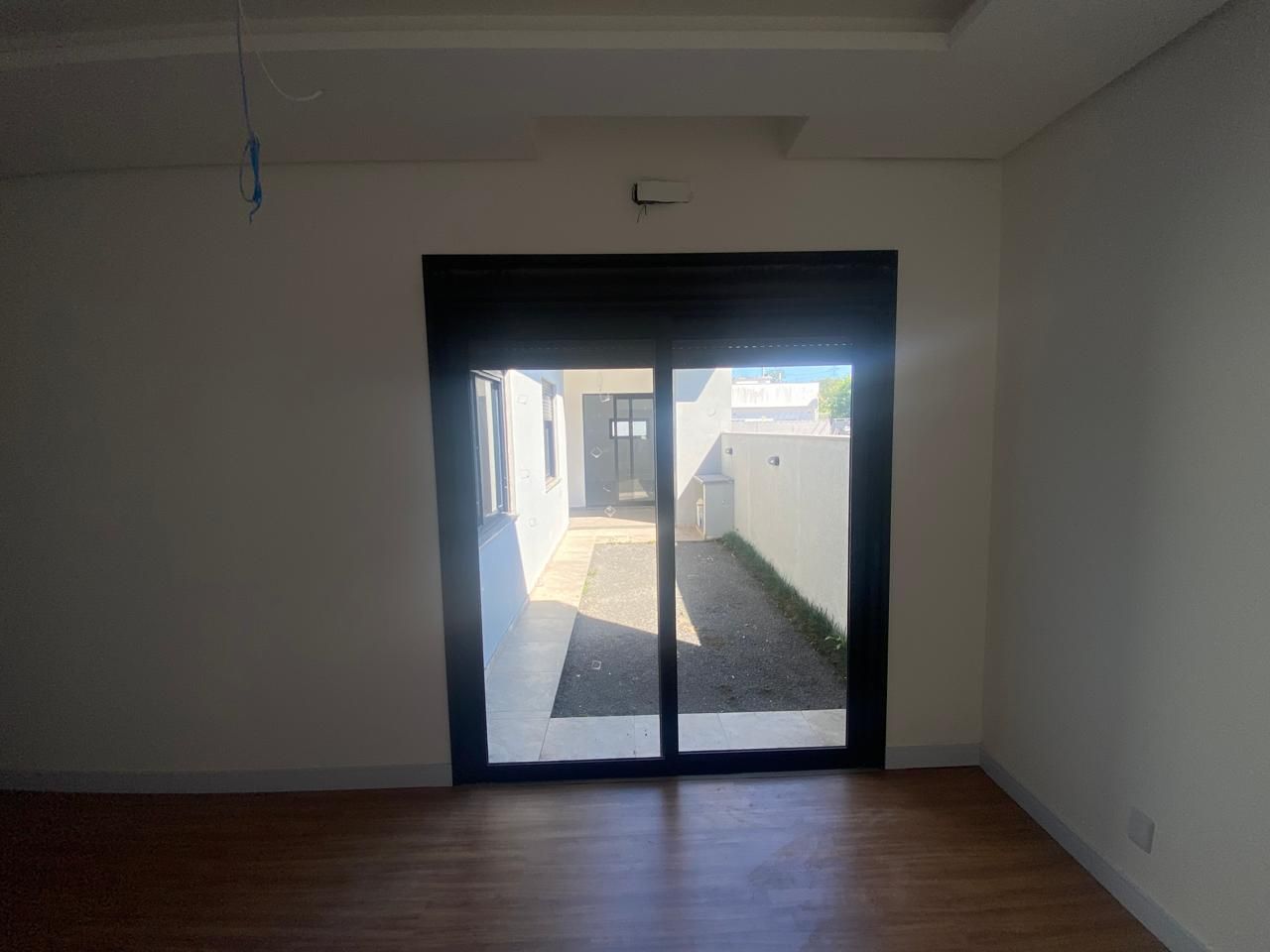 Casa em Condomínio 3 dorm, 151m², sala, cozinha, banheiro, varanda, churrasqueira. — foto 5