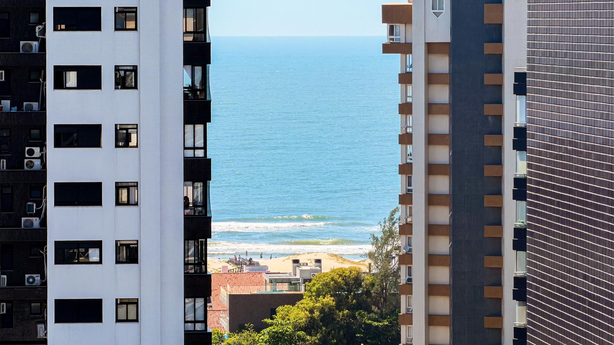 Apto 2 suítes alto andar com vista mar — Punta del Sole, Praia Grande