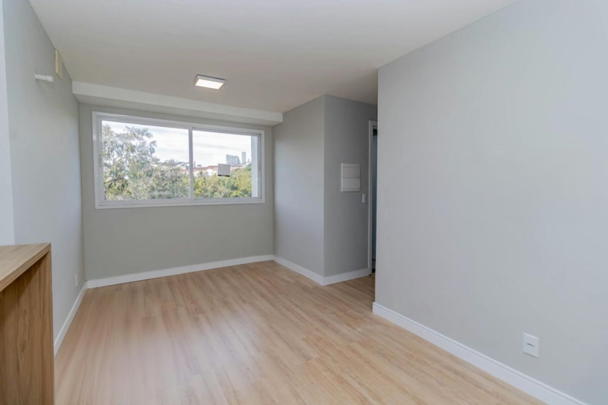 Apartamento à venda com 49m², 2 quartos, 1 vaga no bairro Vila Nova em Porto Alegre