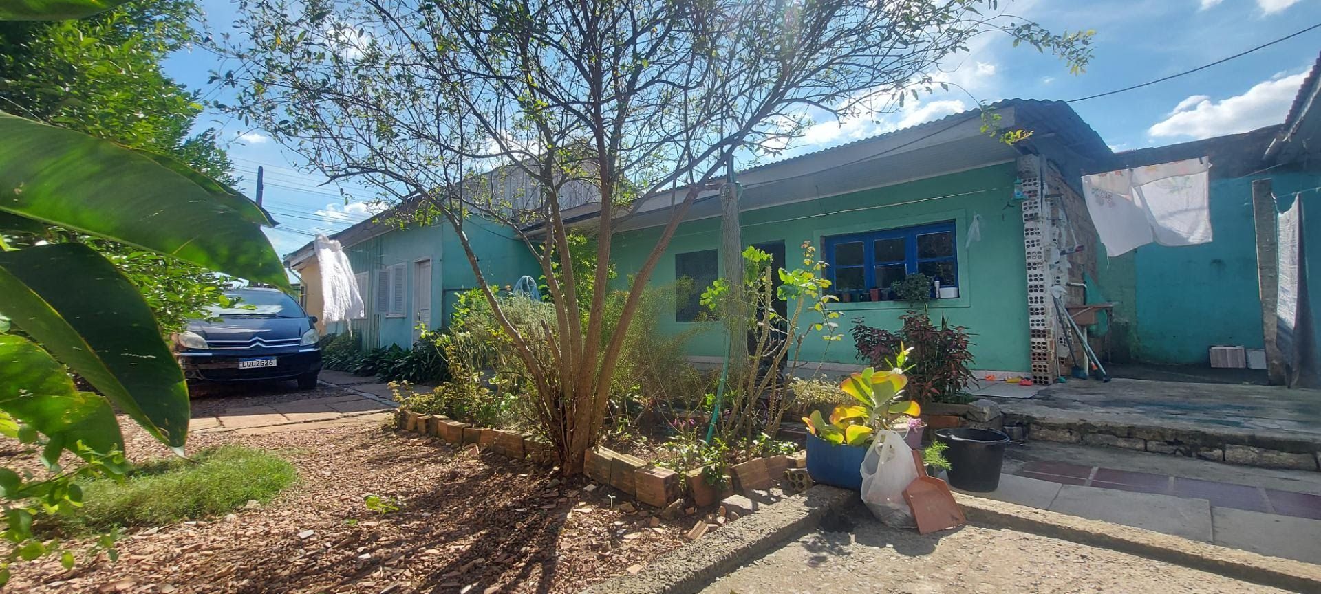 Imóvel com 2 moradias e ponto comercial em Alvorada