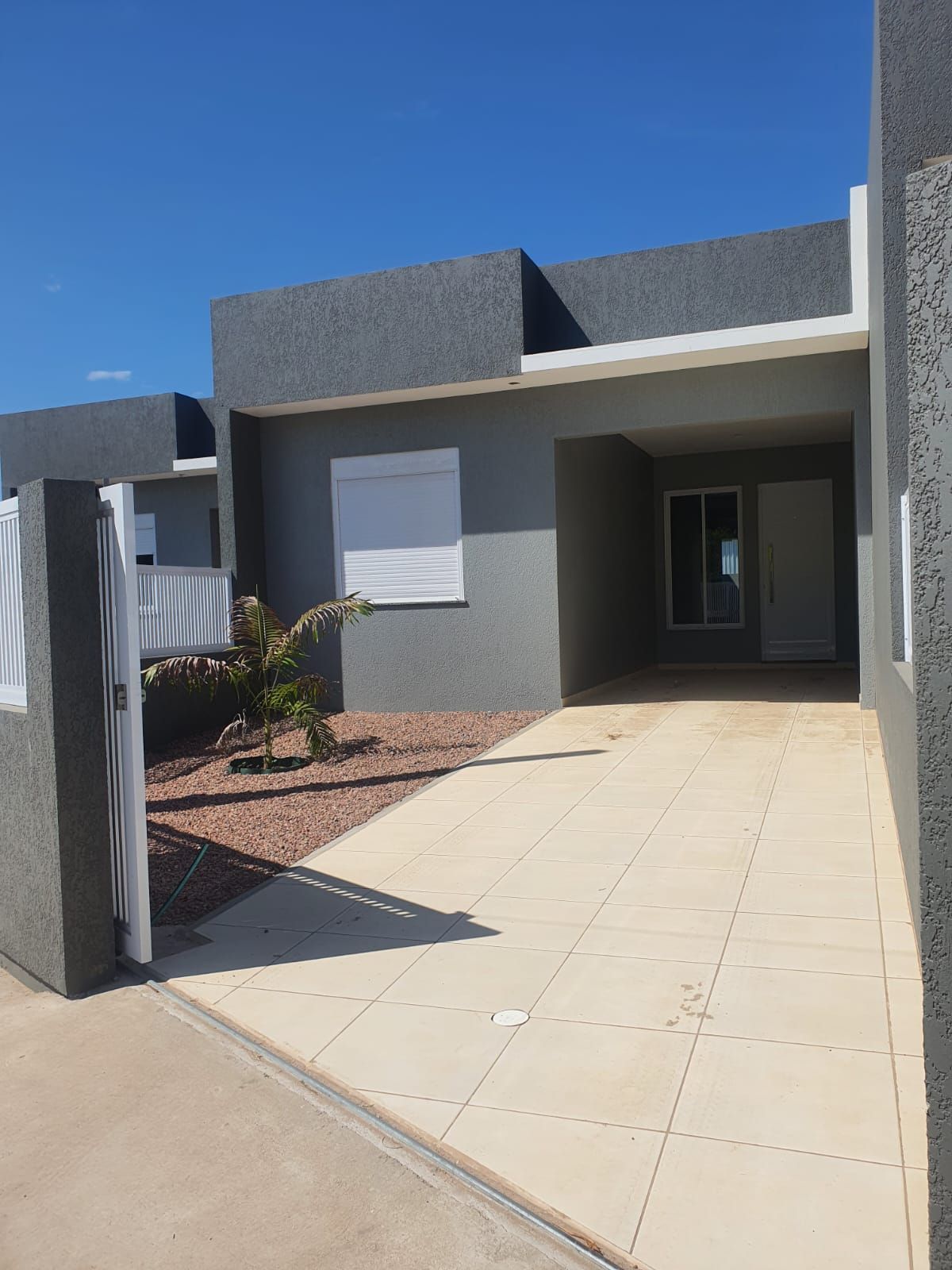 Casa geminada com 2 quartos e vaga de garagem no bairro Cruzeiro do sul