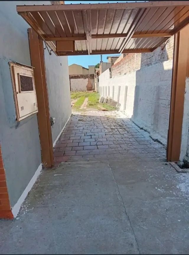 Casa de 3 dormitórios e 2 vagas de garagem no bairro vera Cruz Gravataí.