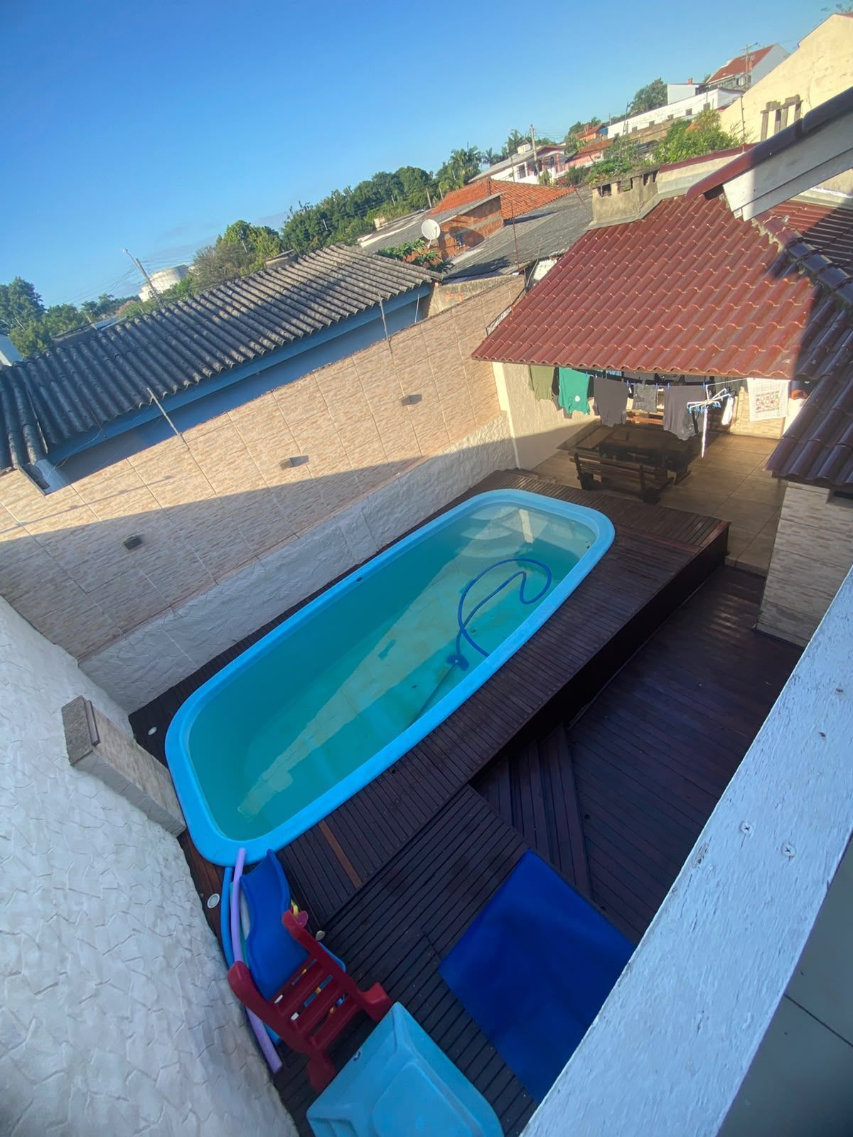 Casa com 4 Dormitórios, Piscina Aquecida e Energia Solar em Esteio