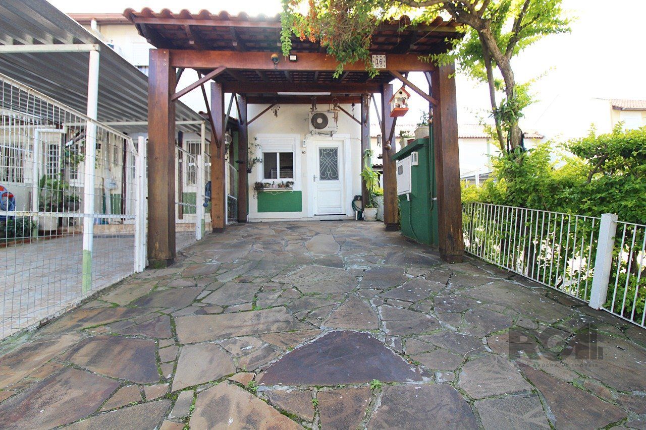 Casa de Condomínio à venda com 89m², 2 quartos, 1 vaga no bairro Hípica em Porto Alegre