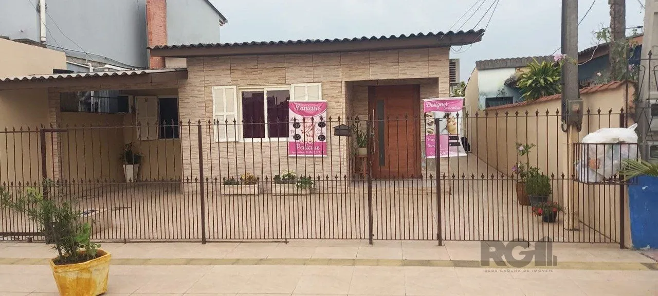 Casa com 108m², 3 dormitórios no bairro Vera Cruz em Gravataí para Comprar