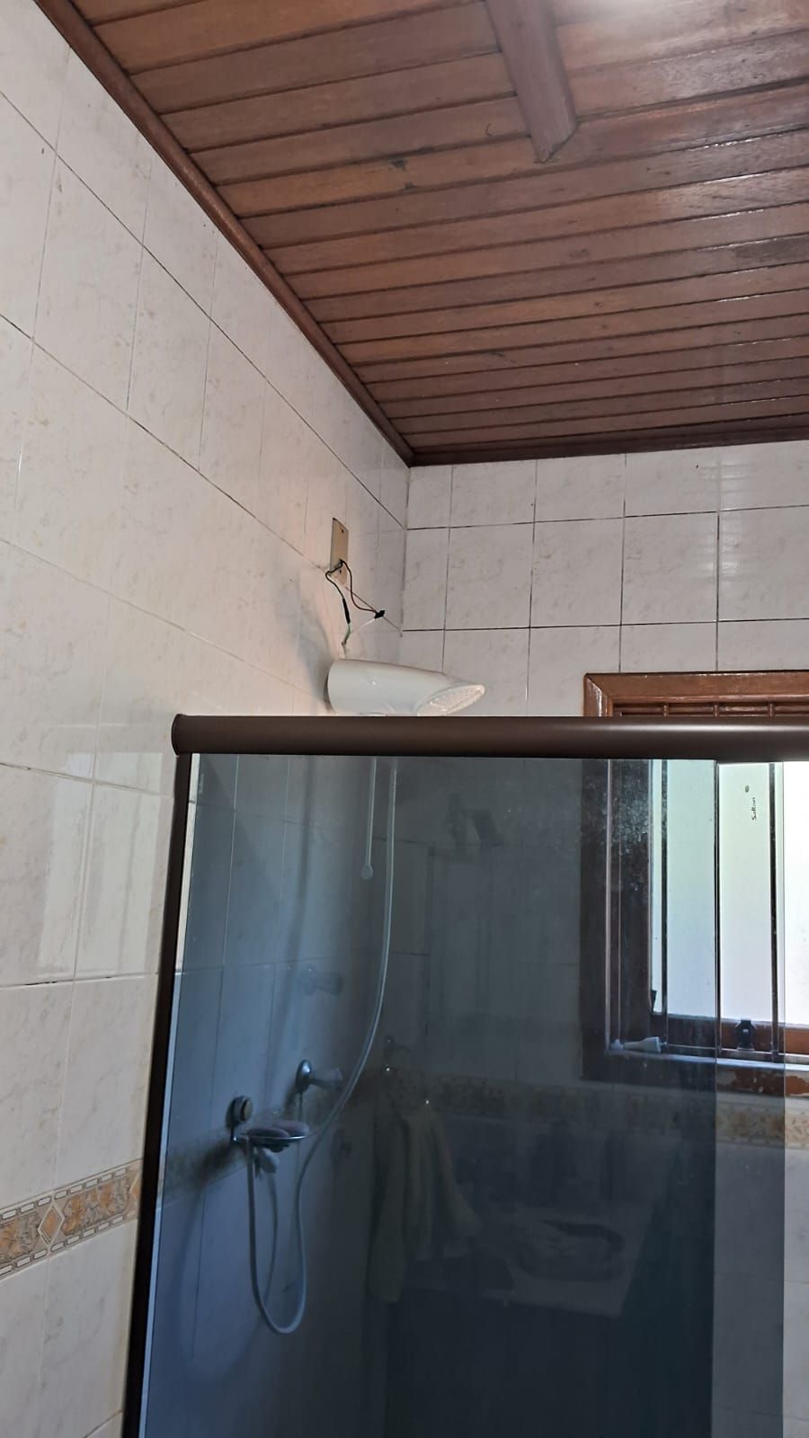 Casa a venda de três quartos com garagem e piscina