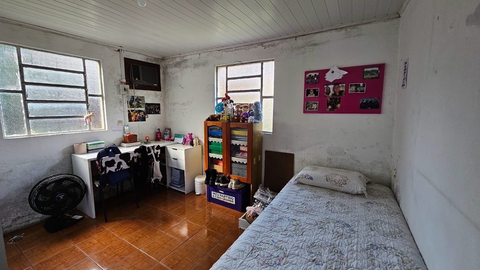 Casa à Venda no Centro: Ampla Residência com Pátio