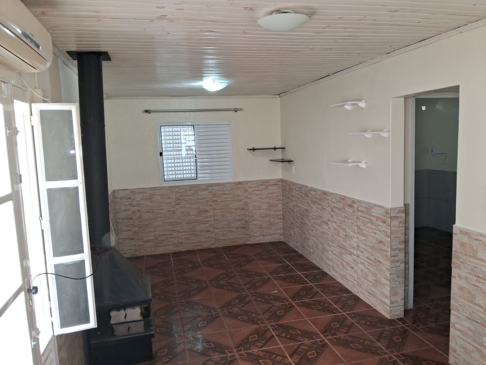 Casa à Venda na Favila, Alegrete – 2 Quartos, Pátio Amplo e Garagem