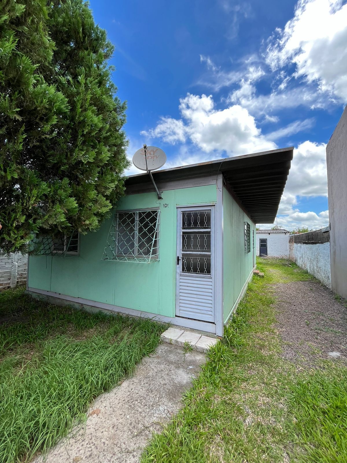 Casa à Venda no Bairro Vera Cruz – 2 Quartos e Churrasqueira