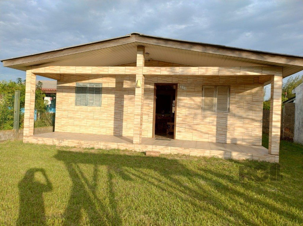Casa à venda com 3 quartos, 70m² - Foto 1