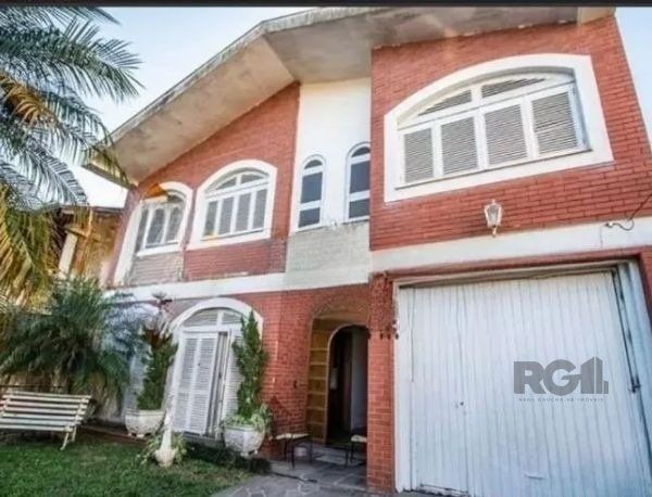Casa sobrado no bairro Tristeza de 4 dormitórios