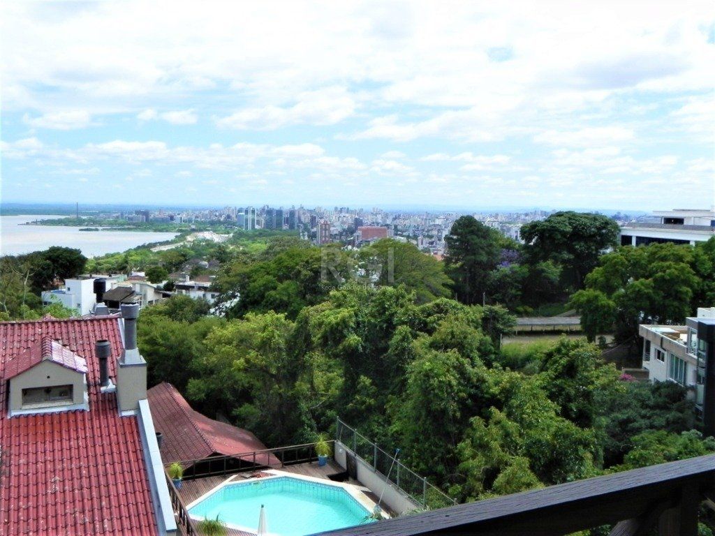 Casa de Condomínio à venda com 459m², 4 quartos, 4 suítes, 4 vagas no bairro Santa Tereza em Porto Alegre