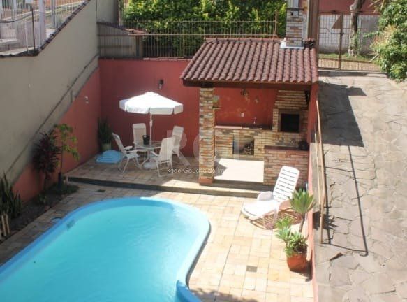 Casa à venda com 3 quartos, 100m² - Foto 1