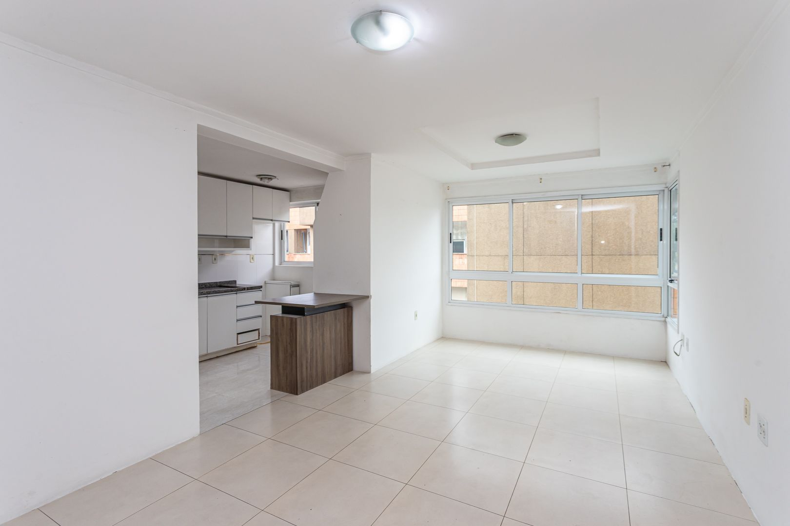 Apartamento de 2 dormitórios e vaga DESOCUPADO