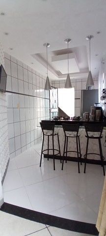 Casa à venda com 3 quartos, 208m² - Foto 6