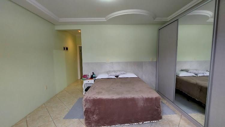 Casa à venda com 4 quartos, 280m² - Foto 6